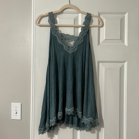 Blue tank top. - Picture 1 of 3